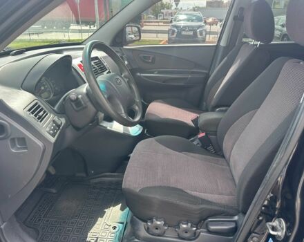 Чорний Хендай Туксон, об'ємом двигуна 2 л та пробігом 306 тис. км за 6900 $, фото 7 на Automoto.ua