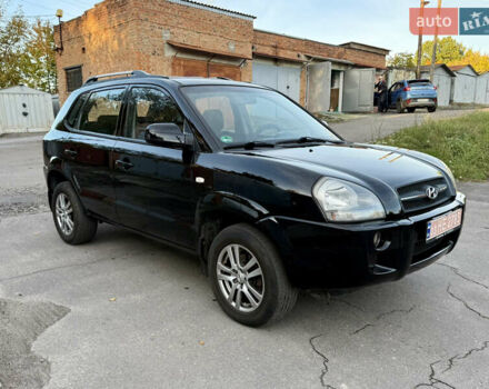 Черный Хендай Туксон, объемом двигателя 2 л и пробегом 189 тыс. км за 7150 $, фото 10 на Automoto.ua