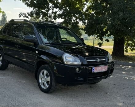 Черный Хендай Туксон, объемом двигателя 2 л и пробегом 266 тыс. км за 7700 $, фото 1 на Automoto.ua