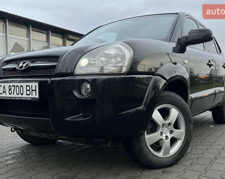 Черный Хендай Туксон, объемом двигателя 2 л и пробегом 242 тыс. км за 6999 $, фото 3 на Automoto.ua