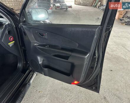 Чорний Хендай Туксон, об'ємом двигуна 2 л та пробігом 252 тис. км за 3000 $, фото 34 на Automoto.ua