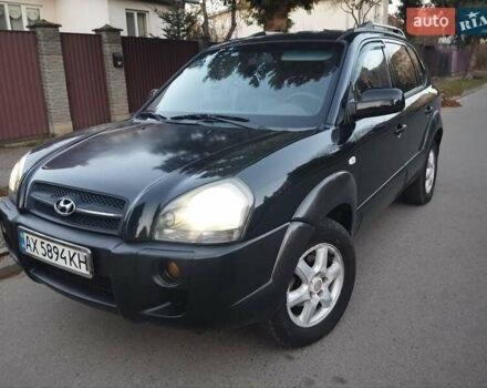 Чорний Хендай Туксон, об'ємом двигуна 1.99 л та пробігом 239 тис. км за 6990 $, фото 2 на Automoto.ua
