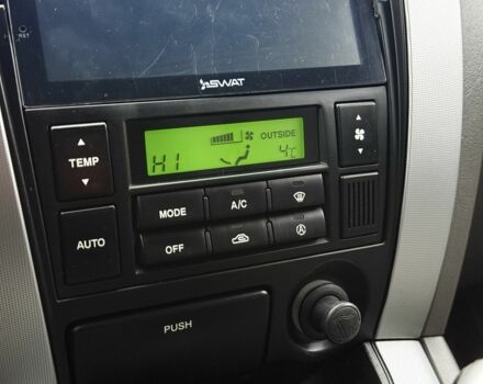 Черный Хендай Туксон, объемом двигателя 2 л и пробегом 263 тыс. км за 7950 $, фото 17 на Automoto.ua