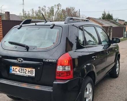 Черный Хендай Туксон, объемом двигателя 1.98 л и пробегом 277 тыс. км за 5350 $, фото 21 на Automoto.ua