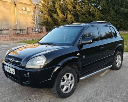 Чорний Хендай Туксон, об'ємом двигуна 2 л та пробігом 235 тис. км за 6700 $, фото 3 на Automoto.ua
