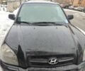Чорний Хендай Туксон, об'ємом двигуна 2 л та пробігом 260 тис. км за 7200 $, фото 1 на Automoto.ua