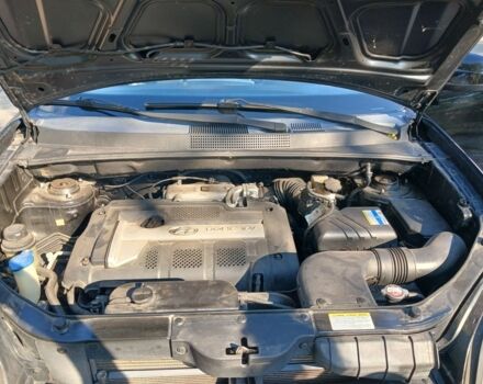 Черный Хендай Туксон, объемом двигателя 2 л и пробегом 180 тыс. км за 7600 $, фото 3 на Automoto.ua