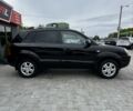 Черный Хендай Туксон, объемом двигателя 2 л и пробегом 163 тыс. км за 8400 $, фото 2 на Automoto.ua