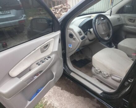 Черный Хендай Туксон, объемом двигателя 2 л и пробегом 395 тыс. км за 4500 $, фото 8 на Automoto.ua