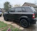 Черный Хендай Туксон, объемом двигателя 2 л и пробегом 395 тыс. км за 4500 $, фото 10 на Automoto.ua