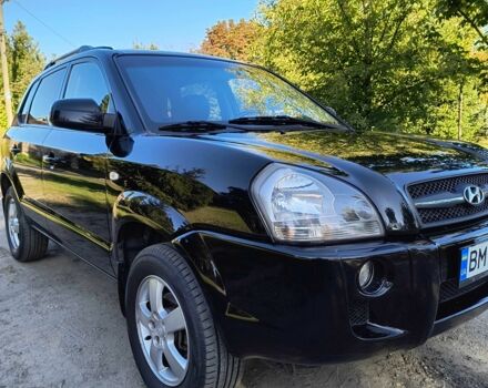 Черный Хендай Туксон, объемом двигателя 2 л и пробегом 206 тыс. км за 7500 $, фото 6 на Automoto.ua