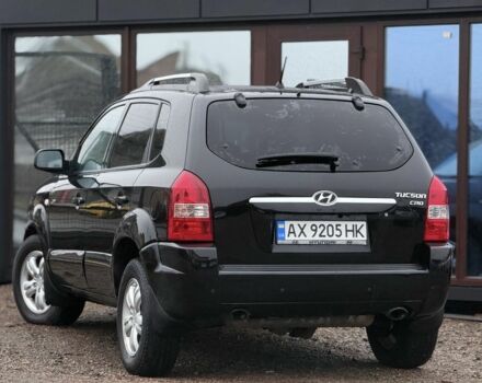 Черный Хендай Туксон, объемом двигателя 2 л и пробегом 263 тыс. км за 7950 $, фото 8 на Automoto.ua