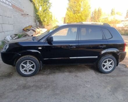 Черный Хендай Туксон, объемом двигателя 2 л и пробегом 203 тыс. км за 7500 $, фото 1 на Automoto.ua