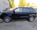 Черный Хендай Туксон, объемом двигателя 2 л и пробегом 203 тыс. км за 7500 $, фото 1 на Automoto.ua