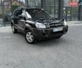 Черный Хендай Туксон, объемом двигателя 1.98 л и пробегом 192 тыс. км за 7800 $, фото 1 на Automoto.ua