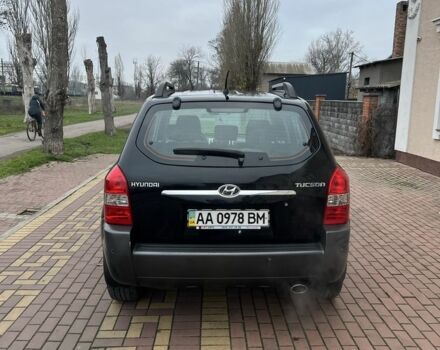 Черный Хендай Туксон, объемом двигателя 2 л и пробегом 220 тыс. км за 7200 $, фото 12 на Automoto.ua