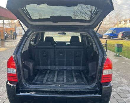 Черный Хендай Туксон, объемом двигателя 2 л и пробегом 355 тыс. км за 7000 $, фото 4 на Automoto.ua