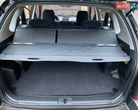 Черный Хендай Туксон, объемом двигателя 1.99 л и пробегом 186 тыс. км за 9400 $, фото 17 на Automoto.ua