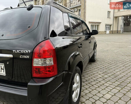 Черный Хендай Туксон, объемом двигателя 1.98 л и пробегом 250 тыс. км за 7150 $, фото 8 на Automoto.ua