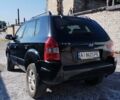 Черный Хендай Туксон, объемом двигателя 1.98 л и пробегом 190 тыс. км за 7800 $, фото 3 на Automoto.ua