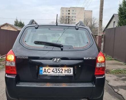 Черный Хендай Туксон, объемом двигателя 1.98 л и пробегом 277 тыс. км за 5350 $, фото 23 на Automoto.ua