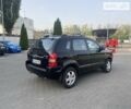 Черный Хендай Туксон, объемом двигателя 2 л и пробегом 238 тыс. км за 9500 $, фото 5 на Automoto.ua