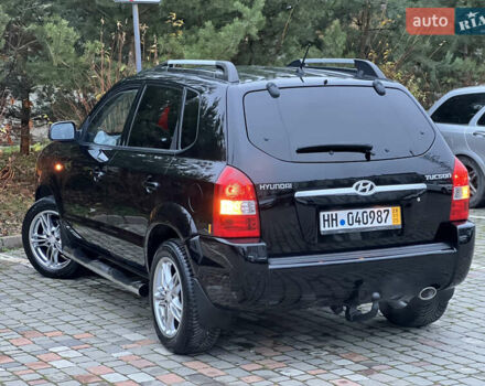 Чорний Хендай Туксон, об'ємом двигуна 1.98 л та пробігом 170 тис. км за 6999 $, фото 42 на Automoto.ua