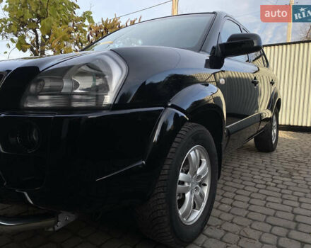 Чорний Хендай Туксон, об'ємом двигуна 1.98 л та пробігом 233 тис. км за 7650 $, фото 14 на Automoto.ua