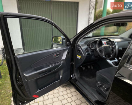 Чорний Хендай Туксон, об'ємом двигуна 1.98 л та пробігом 233 тис. км за 7650 $, фото 28 на Automoto.ua