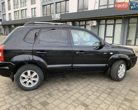 Черный Хендай Туксон, объемом двигателя 1.99 л и пробегом 290 тыс. км за 7700 $, фото 20 на Automoto.ua