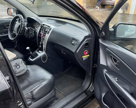 Черный Хендай Туксон, объемом двигателя 2 л и пробегом 242 тыс. км за 6999 $, фото 22 на Automoto.ua