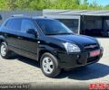 Черный Хендай Туксон, объемом двигателя 2 л и пробегом 190 тыс. км за 7900 $, фото 1 на Automoto.ua