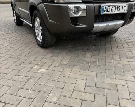 Чорний Хендай Туксон, об'ємом двигуна 2 л та пробігом 124 тис. км за 7950 $, фото 10 на Automoto.ua