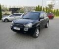 Черный Хендай Туксон, объемом двигателя 2 л и пробегом 238 тыс. км за 9500 $, фото 4 на Automoto.ua