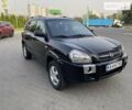 Черный Хендай Туксон, объемом двигателя 2 л и пробегом 238 тыс. км за 9500 $, фото 3 на Automoto.ua