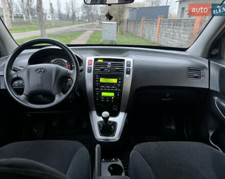 Черный Хендай Туксон, объемом двигателя 1.98 л и пробегом 227 тыс. км за 6900 $, фото 21 на Automoto.ua