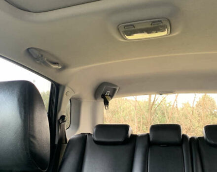 Черный Хендай Туксон, объемом двигателя 1.99 л и пробегом 290 тыс. км за 7700 $, фото 24 на Automoto.ua