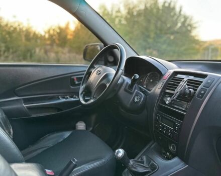 Чорний Хендай Туксон, об'ємом двигуна 2 л та пробігом 235 тис. км за 6700 $, фото 8 на Automoto.ua