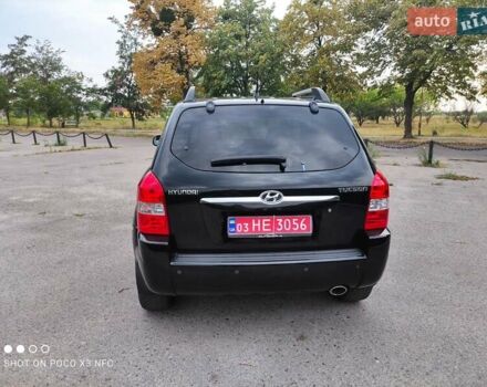 Черный Хендай Туксон, объемом двигателя 2 л и пробегом 249 тыс. км за 8300 $, фото 19 на Automoto.ua