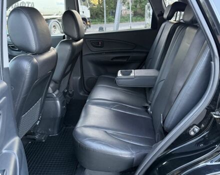 Черный Хендай Туксон, объемом двигателя 2 л и пробегом 235 тыс. км за 7750 $, фото 4 на Automoto.ua