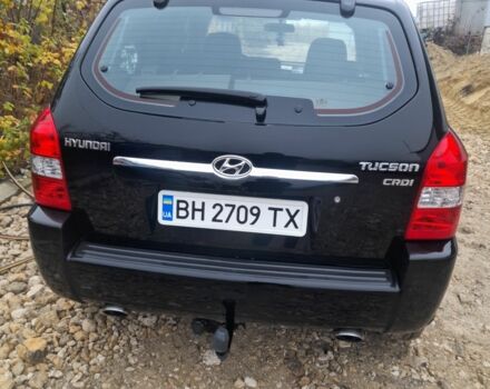 Черный Хендай Туксон, объемом двигателя 2 л и пробегом 230 тыс. км за 6800 $, фото 5 на Automoto.ua