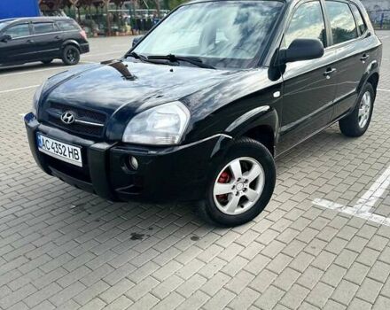 Черный Хендай Туксон, объемом двигателя 1.98 л и пробегом 277 тыс. км за 5350 $, фото 14 на Automoto.ua