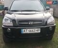 Черный Хендай Туксон, объемом двигателя 2 л и пробегом 247 тыс. км за 6300 $, фото 1 на Automoto.ua
