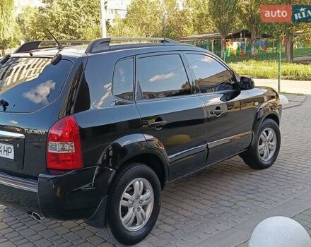 Чорний Хендай Туксон, об'ємом двигуна 2 л та пробігом 141 тис. км за 7999 $, фото 13 на Automoto.ua