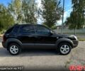 Чорний Хендай Туксон, об'ємом двигуна 2 л та пробігом 250 тис. км за 5600 $, фото 1 на Automoto.ua