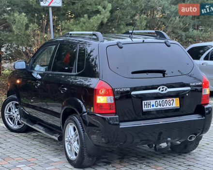 Чорний Хендай Туксон, об'ємом двигуна 1.98 л та пробігом 170 тис. км за 6999 $, фото 58 на Automoto.ua