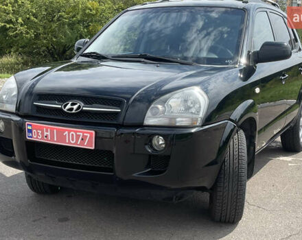 Черный Хендай Туксон, объемом двигателя 2 л и пробегом 236 тыс. км за 6950 $, фото 1 на Automoto.ua