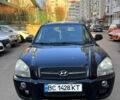 Черный Хендай Туксон, объемом двигателя 2 л и пробегом 235 тыс. км за 6400 $, фото 1 на Automoto.ua