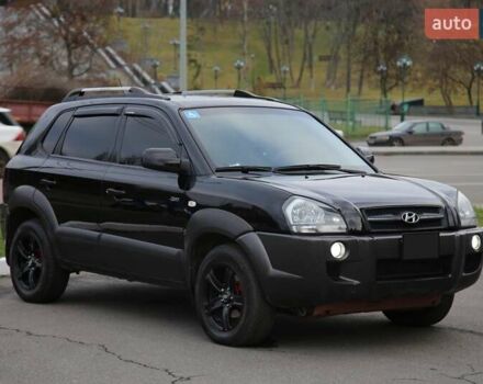 Черный Хендай Туксон, объемом двигателя 2.66 л и пробегом 217 тыс. км за 8600 $, фото 2 на Automoto.ua