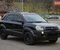 Черный Хендай Туксон, объемом двигателя 2.66 л и пробегом 217 тыс. км за 8600 $, фото 2 на Automoto.ua